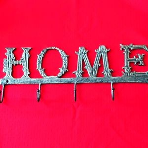 Metal HOME sign with hooks